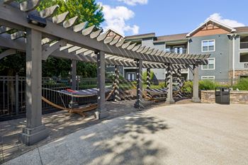 Covered pergola with swings